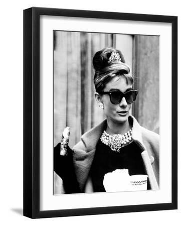 Breakfast at Tiffany's, Audrey Hepburn Eating Between Scenes on Set, 1961 - Black Framed Art Print Wall Art, 12x16 Breakfast at Tiffany's, Audrey Hepburn Eating Between Scenes on Set, 1961 - Black Framed Art Print Wall Art, 12x16