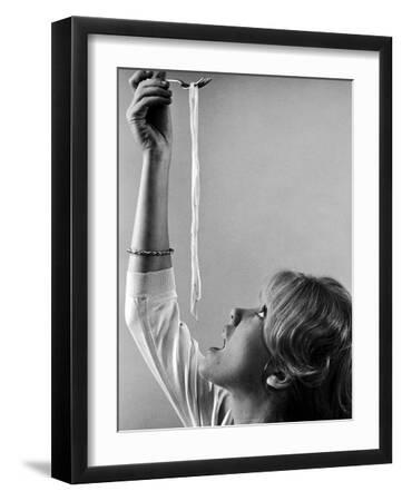 Hayley Mills Attempting to Eat Spaghetti - Black Framed Art Print Wall Art, 12x16