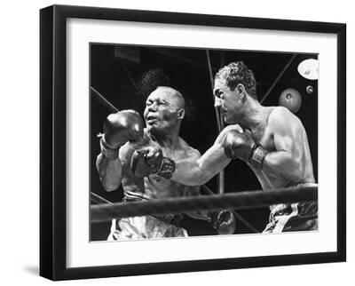 Rocky Marciano Landing a Punch on Jersey Joe Walcott, Sept. 23, 1952 - Black Framed Art Print Wall Art, 16x12